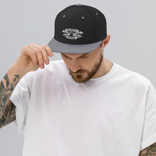 Remedy Motel RV Crest Snapback Hat (multiple colors available)